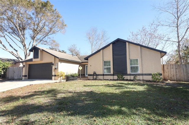 single story home featuring a front yard and a garage