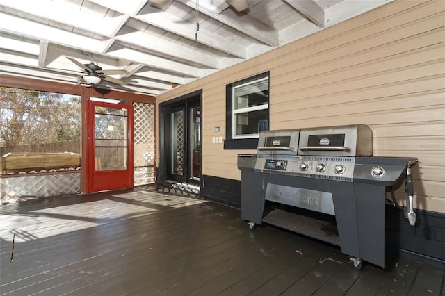 deck with a grill and ceiling fan