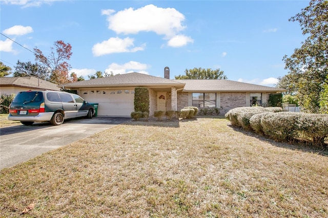 single story home with a garage