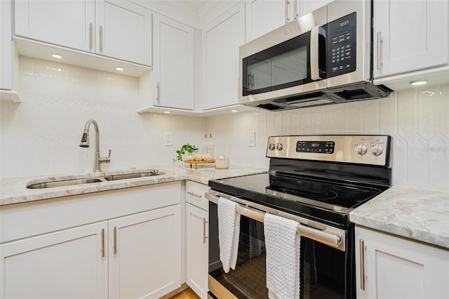 kitchen with white cabinets and stainless steel appliances