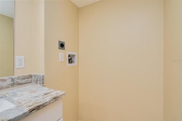 clothes washing area featuring hookup for an electric dryer and hookup for a washing machine