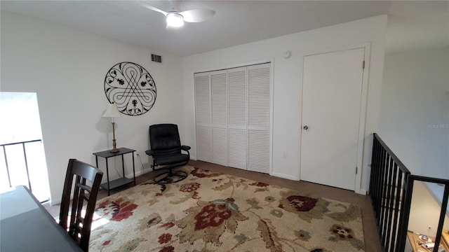 living area featuring carpet flooring