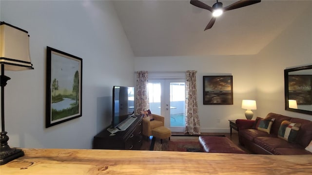 living room with ceiling fan, french doors, and lofted ceiling