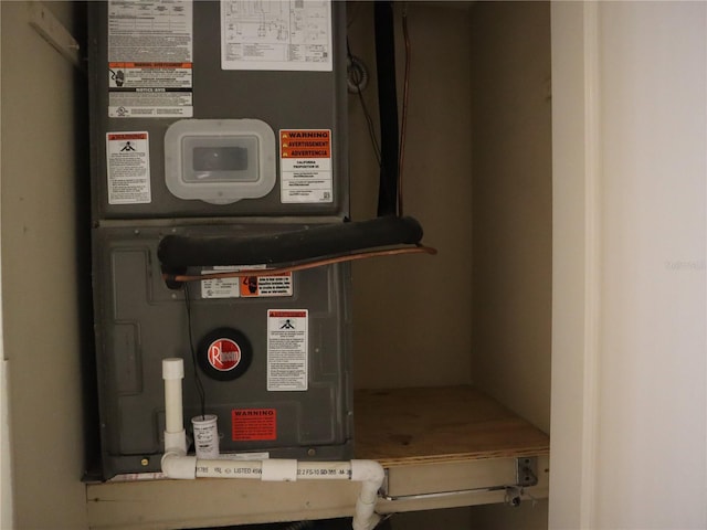 utility room with heating unit