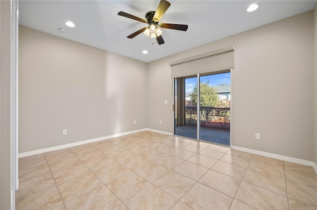 tiled empty room with ceiling fan