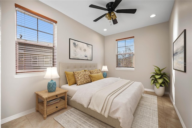 bedroom featuring ceiling fan and light tile patterned floors