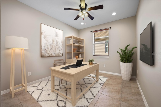 office featuring ceiling fan and light tile patterned floors