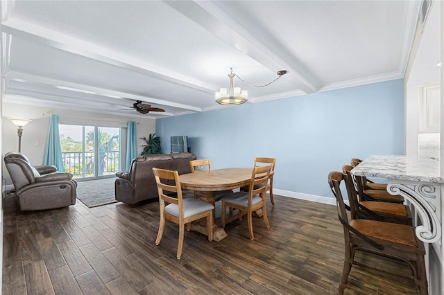 dining space with dark wood-type flooring, beamed ceiling, ceiling fan with notable chandelier, and ornamental molding