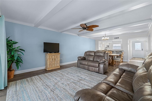 living room featuring beam ceiling, dark hardwood / wood-style flooring, crown molding, and ceiling fan with notable chandelier