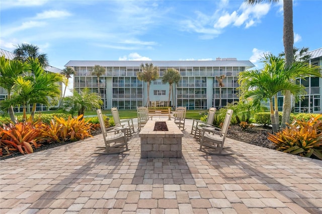 view of patio featuring an outdoor fire pit