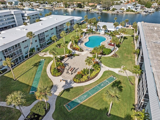 birds eye view of property featuring a water view