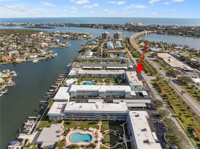 birds eye view of property featuring a water view