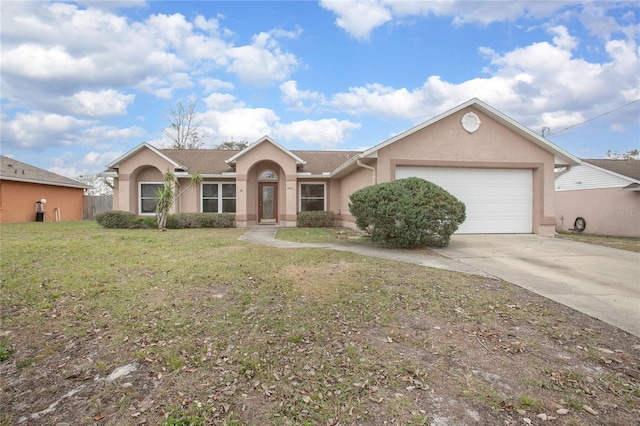 ranch-style home featuring a front yard and a garage