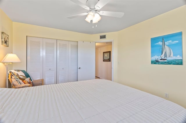 bedroom featuring ceiling fan and a closet