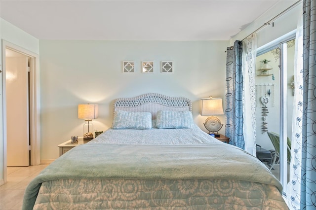 bedroom featuring light tile patterned floors