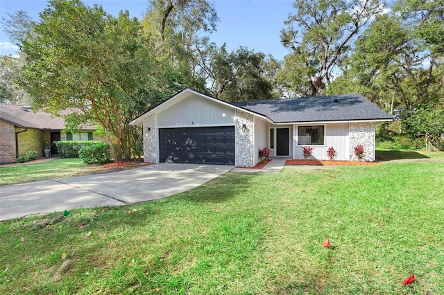 ranch-style house with a front yard and a garage