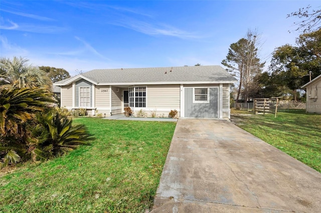 single story home featuring a front yard