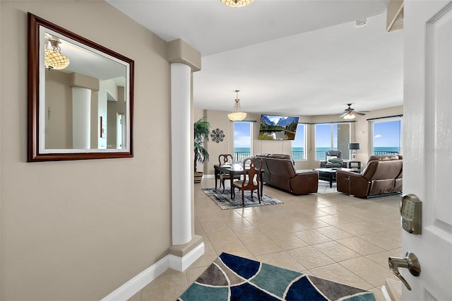 hall featuring light tile patterned floors