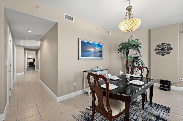 dining area featuring light tile patterned floors