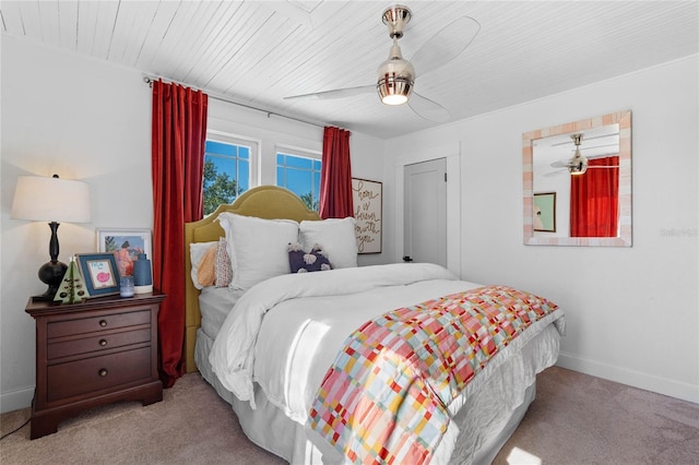 bedroom with light colored carpet and ceiling fan