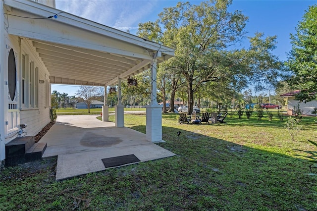 view of yard with a patio area