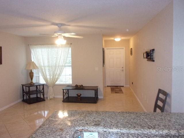 unfurnished dining area with ceiling fan