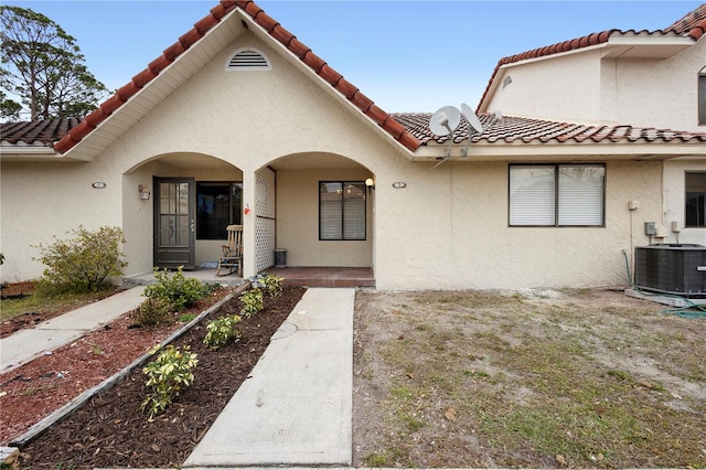 view of front of house featuring central AC unit