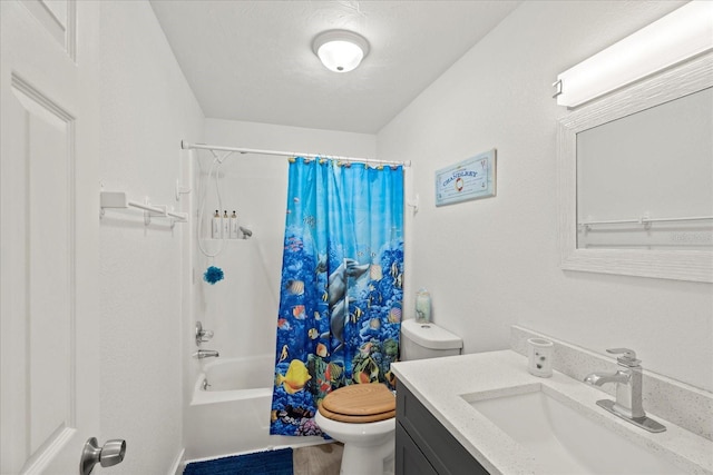 full bathroom featuring wood-type flooring, toilet, vanity, and shower / tub combo