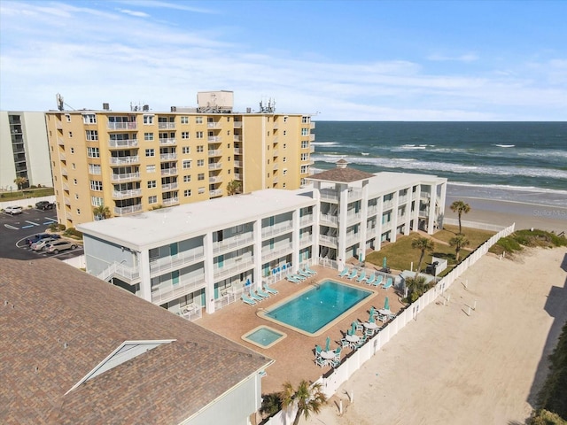 aerial view with a beach view and a water view