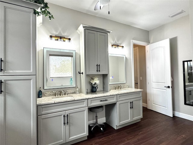 bathroom featuring vanity, ceiling fan, and hardwood / wood-style flooring