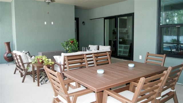 view of carpeted dining area