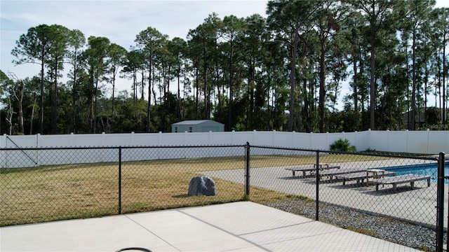 view of patio / terrace featuring a fenced in pool