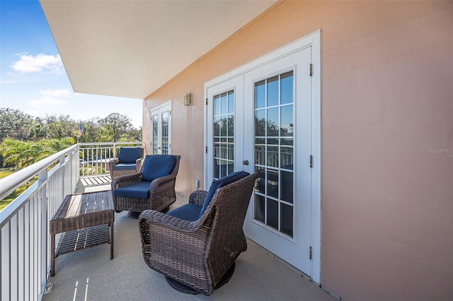 balcony featuring french doors