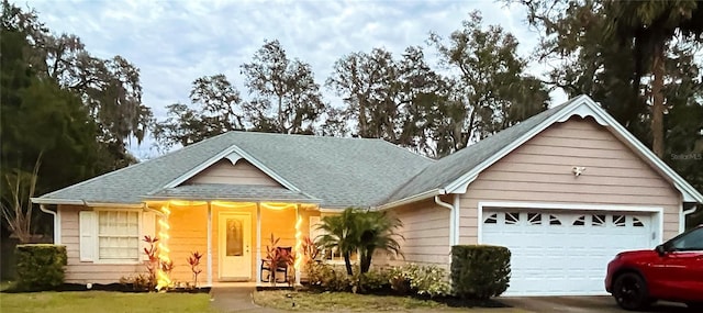 view of front of home with a garage