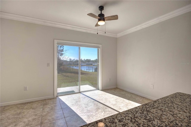 tiled empty room with a water view, ceiling fan, and crown molding