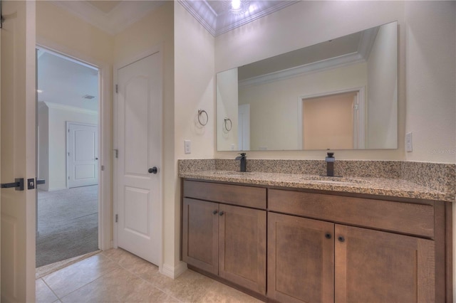 bathroom with vanity, tile patterned flooring, and ornamental molding