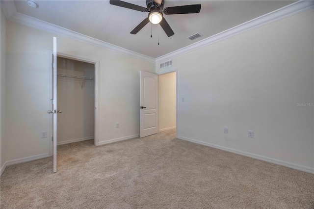 unfurnished bedroom with light carpet, ceiling fan, and ornamental molding