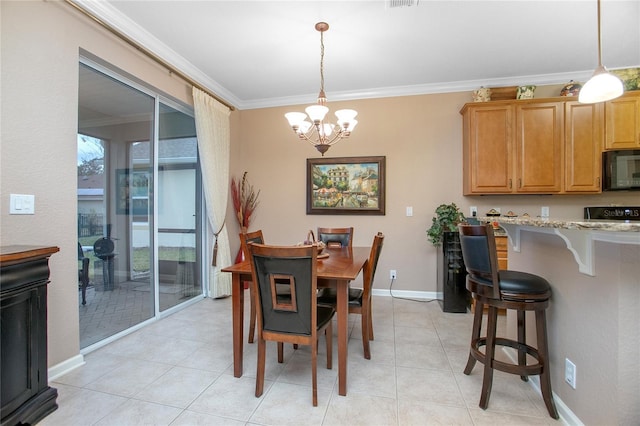 dining space featuring light tile patterned floors, a notable chandelier, and ornamental molding