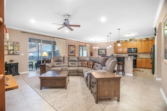 tiled living room featuring ceiling fan and crown molding