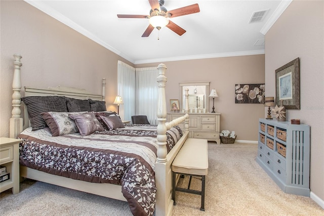 carpeted bedroom featuring ceiling fan and ornamental molding