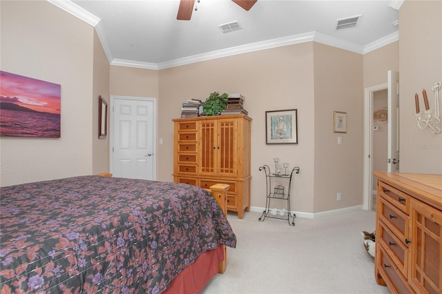 carpeted bedroom with ceiling fan and ornamental molding