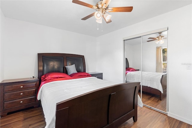 bedroom with wood-type flooring, ceiling fan, and a closet