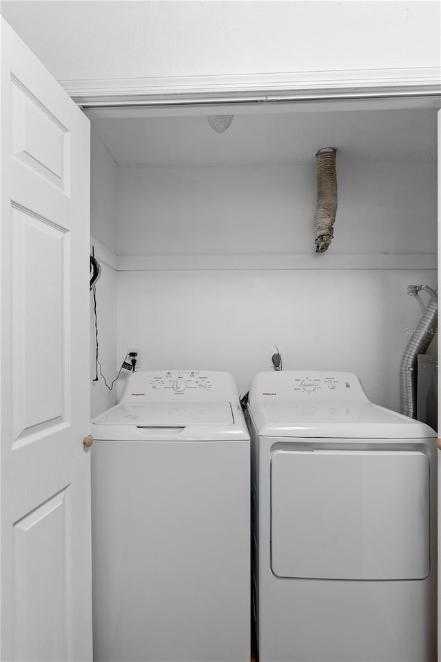 laundry room with washer and dryer