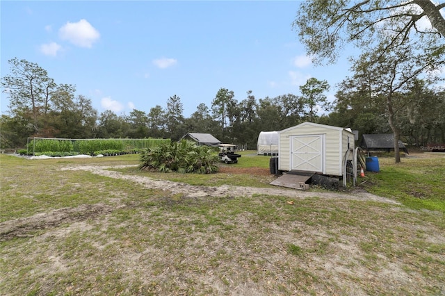 view of yard with a shed