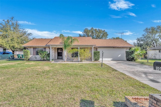 ranch-style house featuring a garage and a front yard