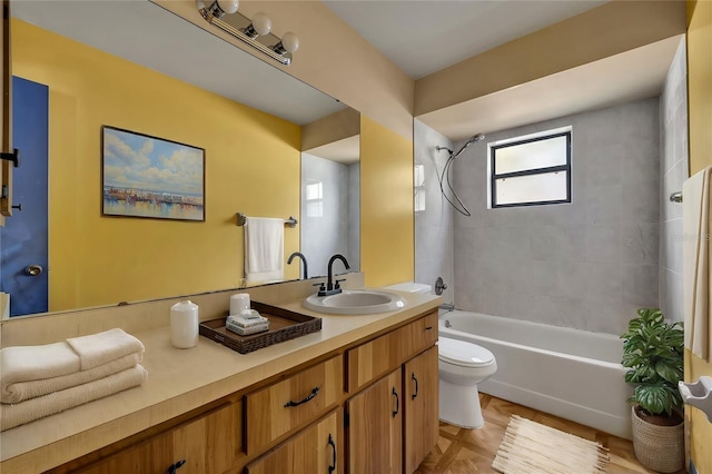 full bathroom with parquet flooring, vanity, toilet, and tiled shower / bath combo