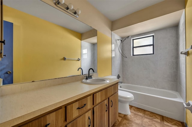 full bathroom featuring vanity, parquet flooring, tiled shower / bath, and toilet