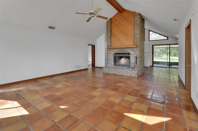 unfurnished living room with visible vents, baseboards, a fireplace, tile patterned flooring, and beamed ceiling