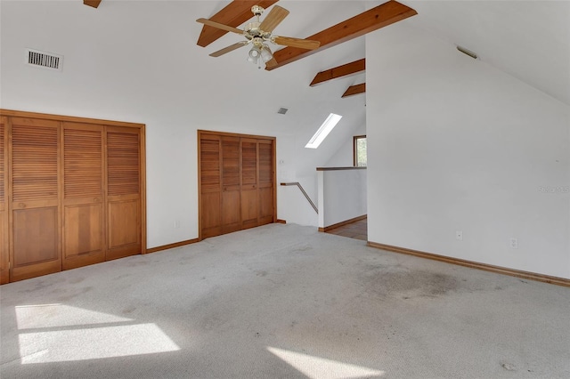 additional living space with beamed ceiling, visible vents, high vaulted ceiling, carpet, and baseboards