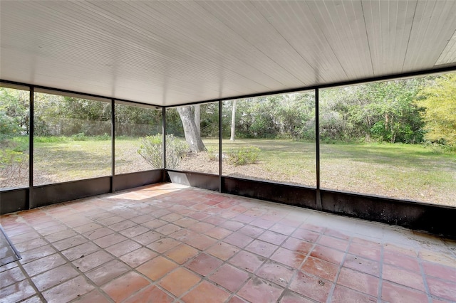 unfurnished sunroom with plenty of natural light